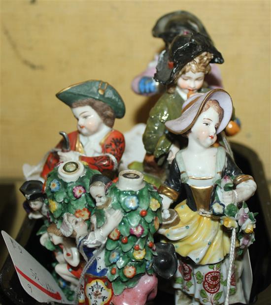 Two Samson figural scent bottles and four small porcelain figures(-)